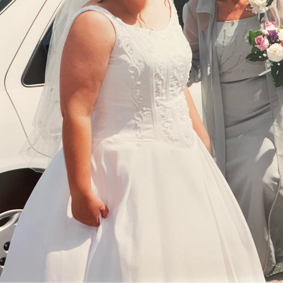 Size 18 white wedding dress. Comes with the train and petticoat. $1200 OBO - Picture 10 of 11